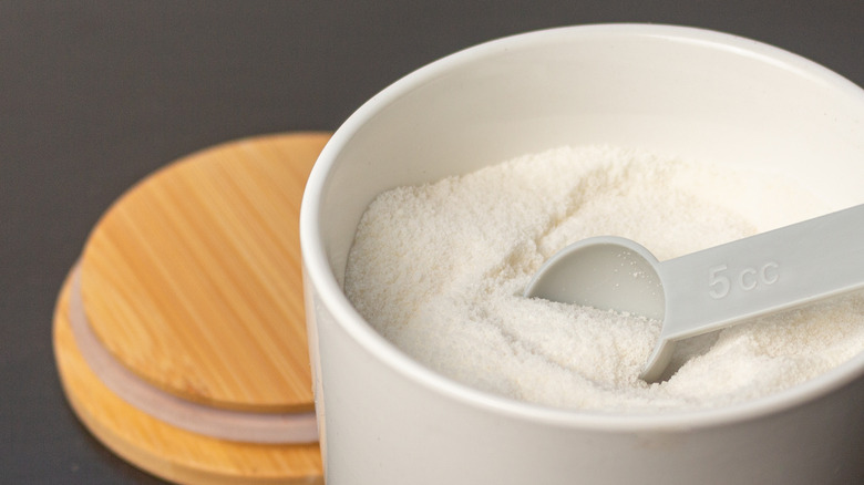 measuring spoon in sugar canister