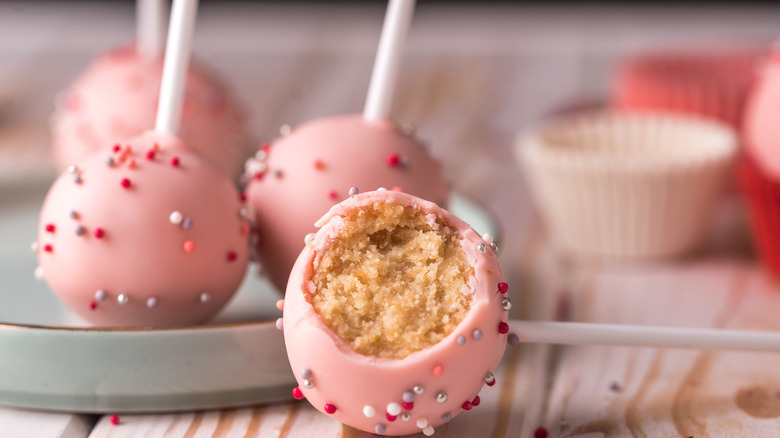 cake pops with pink frosting