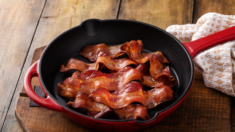 cooking bacon in skillet