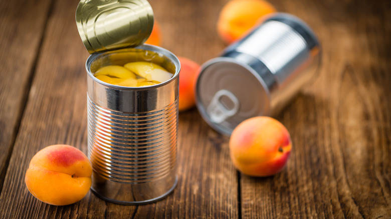 canned apricots on table