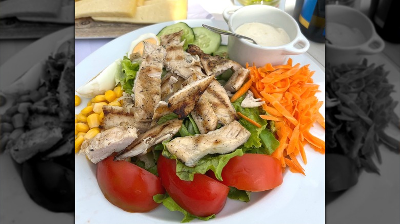 A simple green salad with chicken