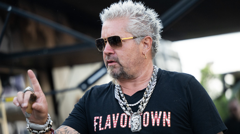 Guy Fieri in a "Flavortown" t-shirt