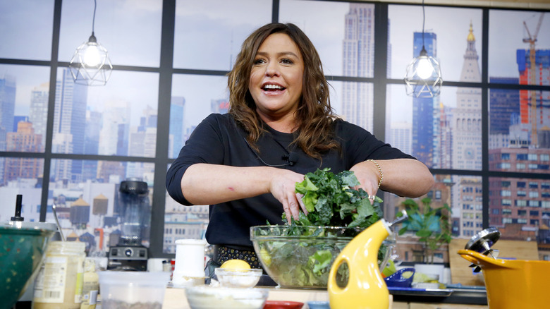 Rachael Ray mixing a salad