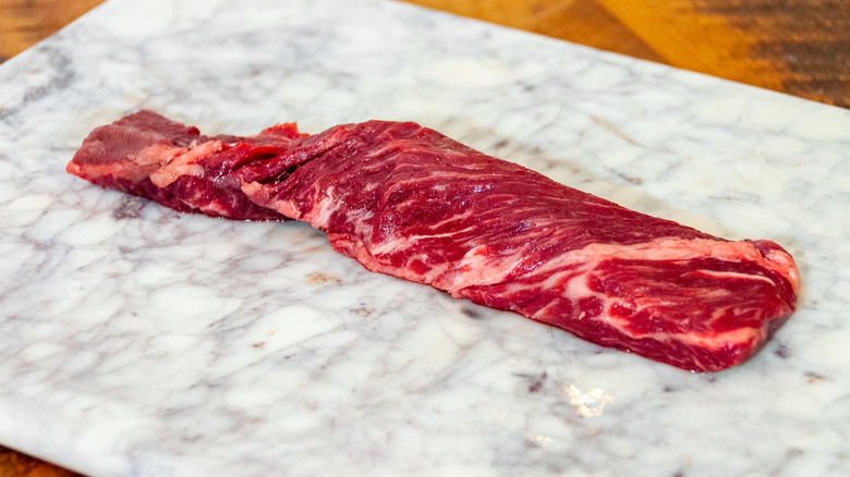 A raw piece of hanger steak