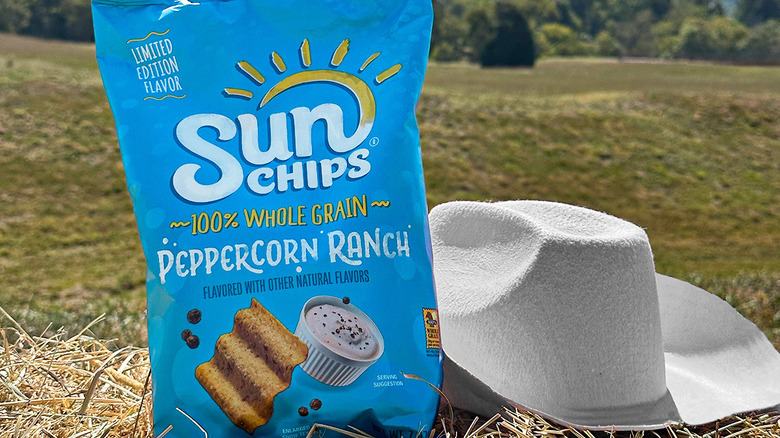 Peppercorn Ranch Sun Chips in a field with a cowboy hat