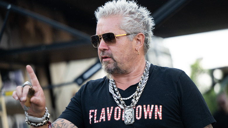 Guy Fieri in a Flavortown shirt