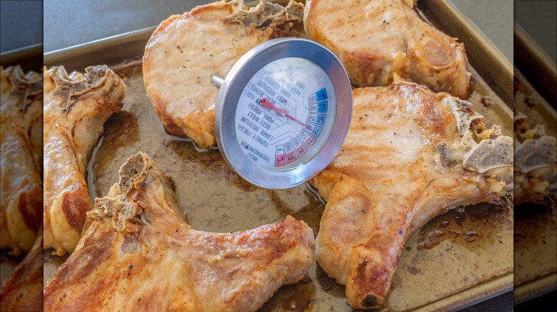 meat thermometer in pork chops