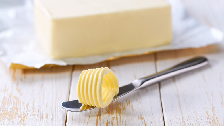 Curl of butter on knife