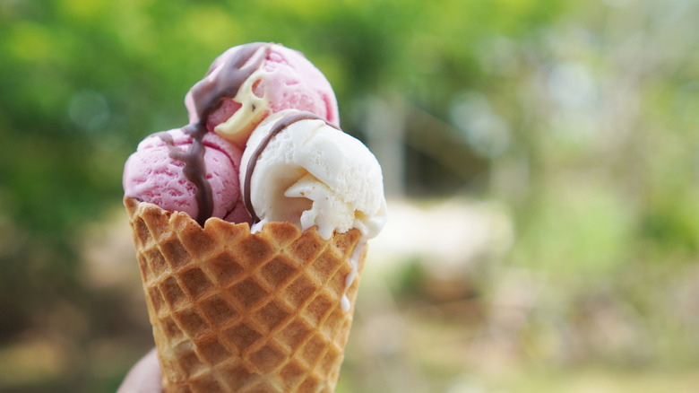 three scoops gelato in waffle cone