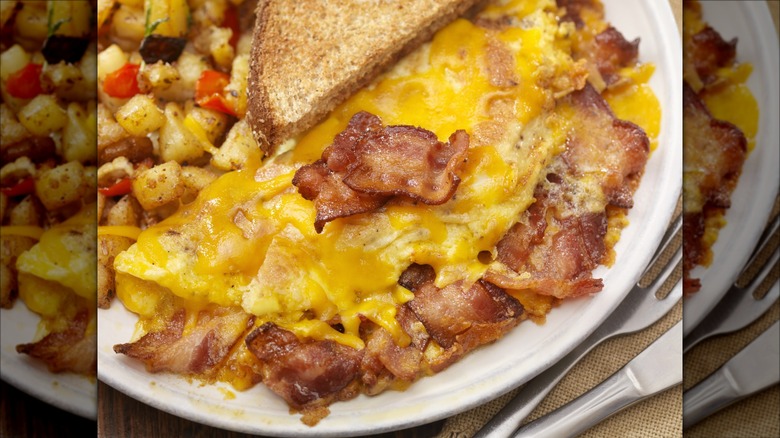 omelet with bacon on plate