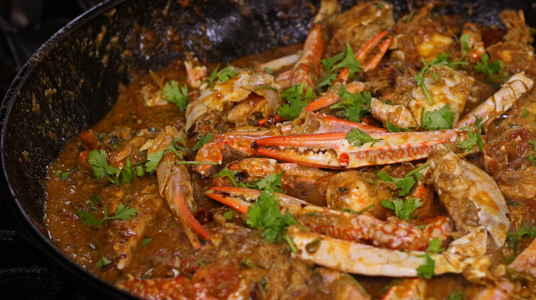 Crab curry cooking in a pot