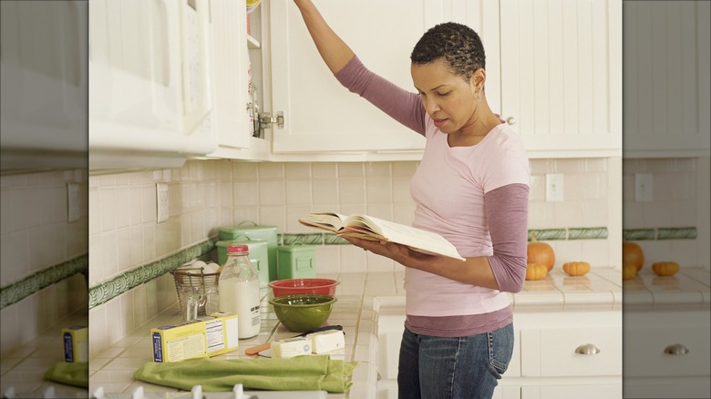 woman reading recipe