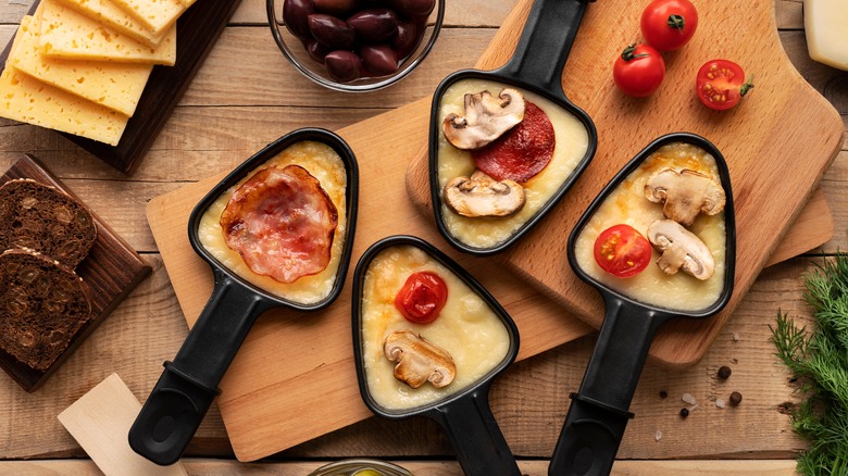 Raclette cheese in pots