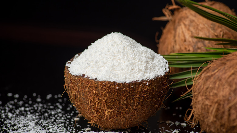 coconut flour in a coconut shell