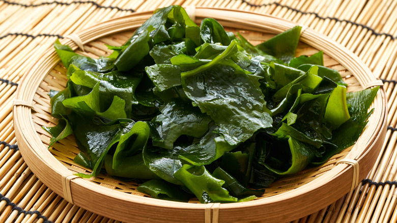 A bamboo dish of seaweed