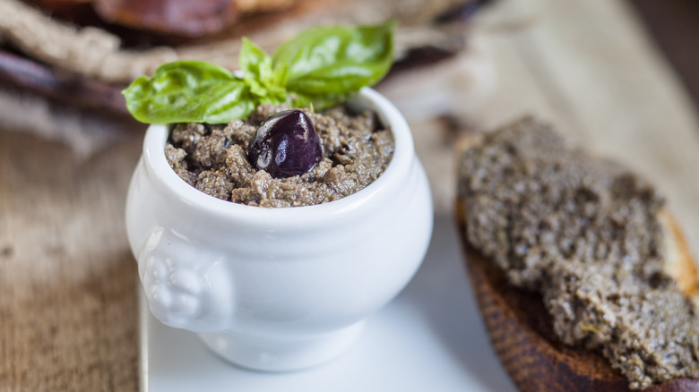 A dish of olive paste