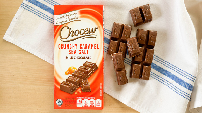 Choceur Crunchy Caramel Sea Salt Milk Chocolate with packaging on table