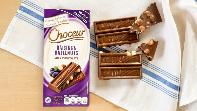 Choceur Raisins and Hazelnuts Milk Chocolate bar on table with packaging