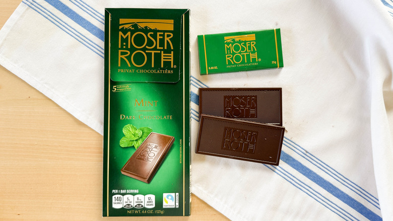 Moser Roth Mint Dark Chocolate on white napkin with packaging