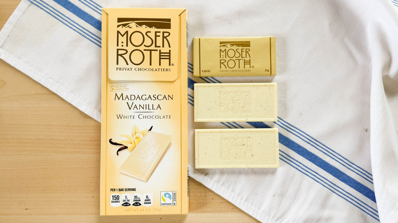 Moser Roth Madagascan Vanilla White Chocolate pieces on white napkin