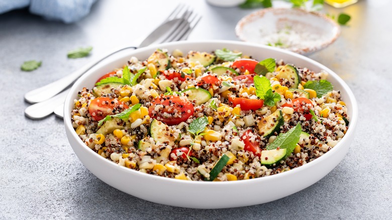 Bowl of quinoa and chopped vegetables