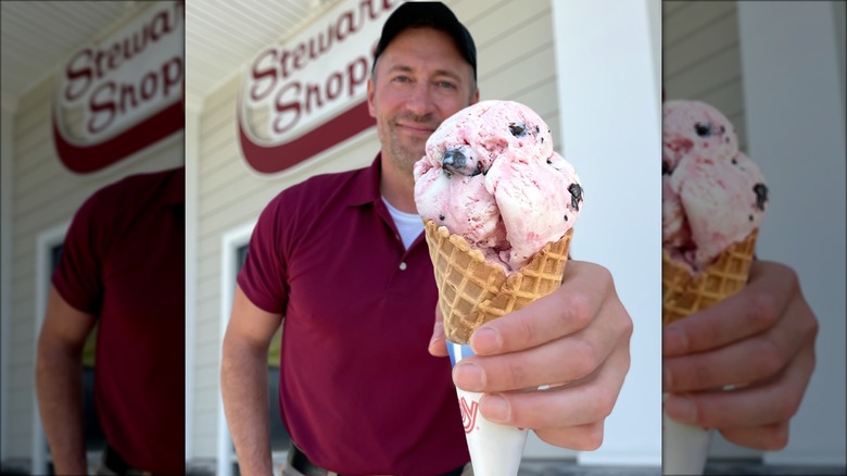man holding ice cream cone