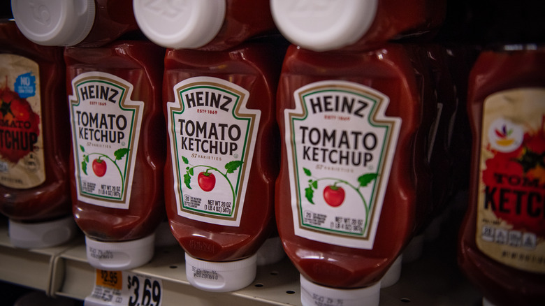 A shelf of ketchup