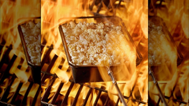 making popcorn over grill