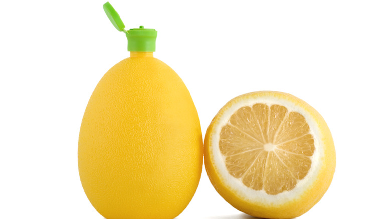 lemon and lemon juice bottle