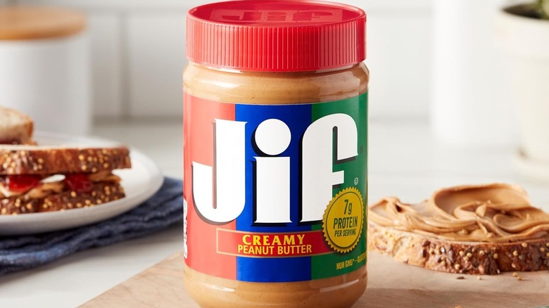 jar of Jif Peanut Butter near toast