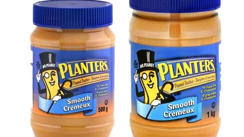 two jars of Planters Smooth Peanut Butter