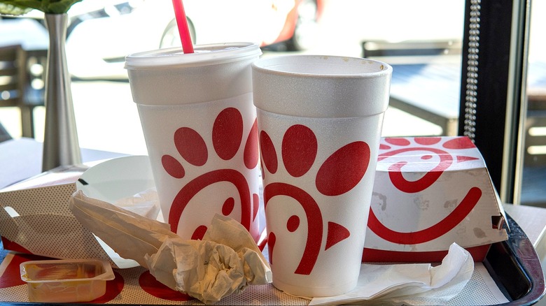 Two Chick-fil-A cups next to each other on a tray