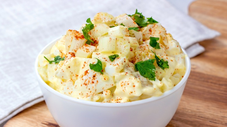 potato salad in white bowl