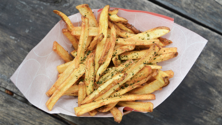 A bowl of seasoned french fries