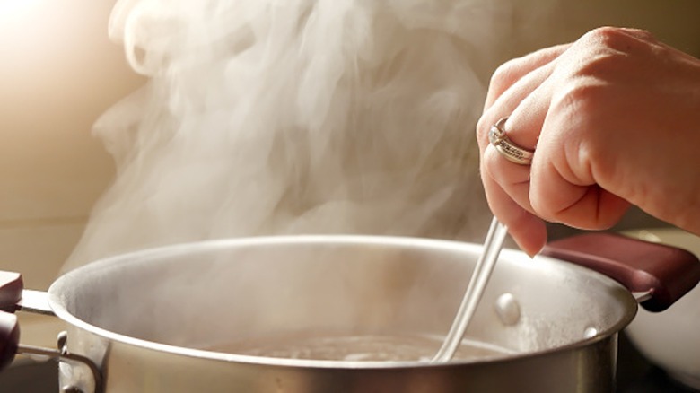 stirring pot of water