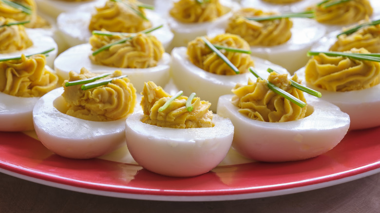 Deviled eggs topped with chives