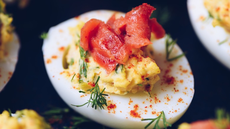 Deviled eggs topped with salmon roe