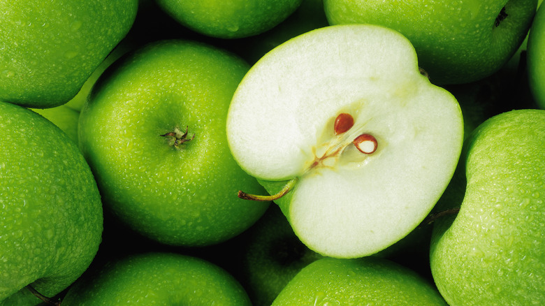 A pile of green apples