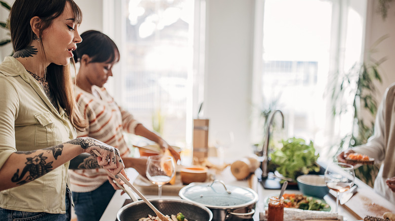 Two women working together in the kitchen