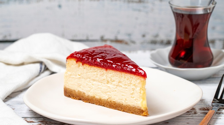 A slice of strawberry cheesecake
