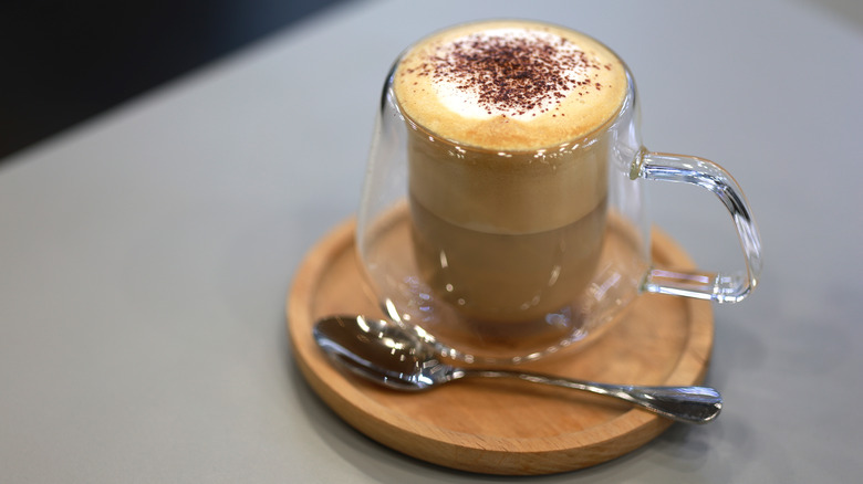 A frothy cappucino sprinkled with chocolate