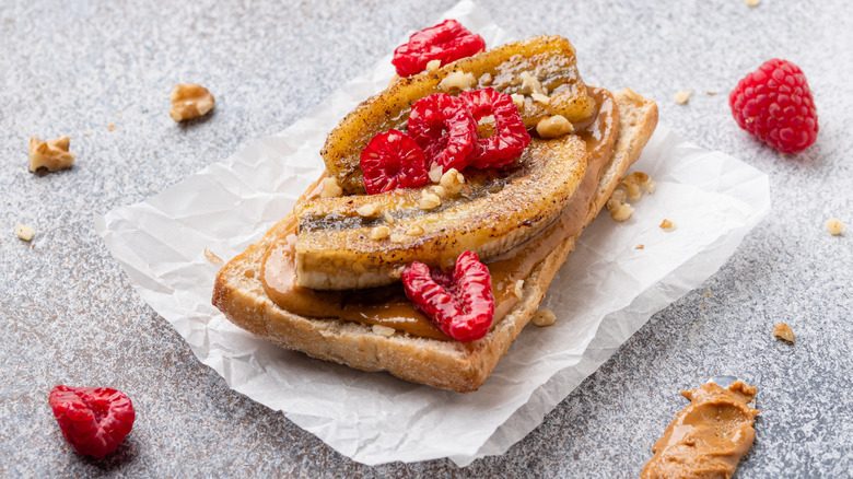 fresh fruit on peanut butter toast