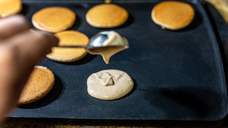 cooking pancakes on griddle