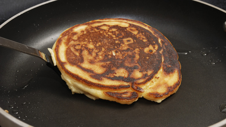 burnt pancake in pan