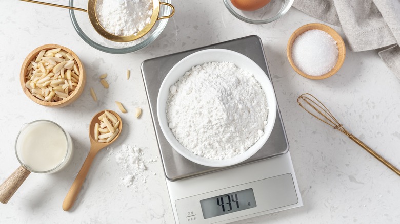 weighing flour on a scale