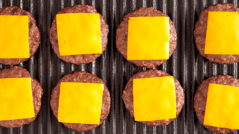cheese burgers on grill