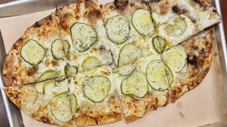 Pizza with dill pickle slices