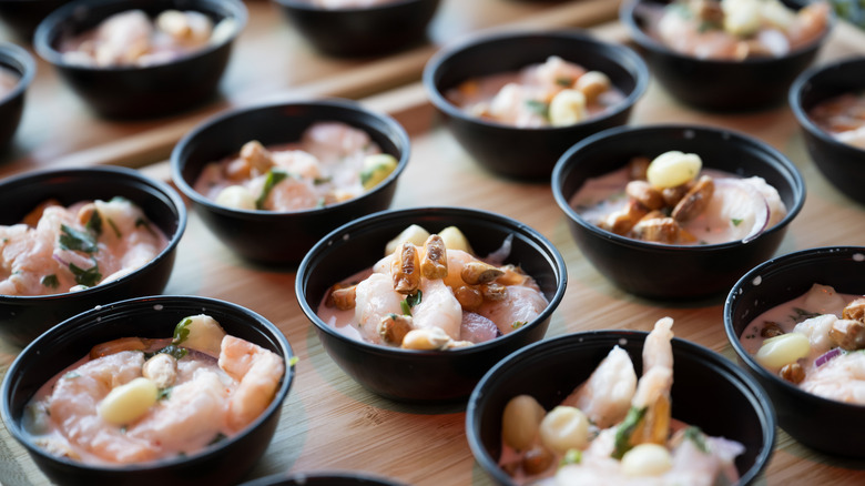 black bowls of food at the South Beach Wine & Food Festival