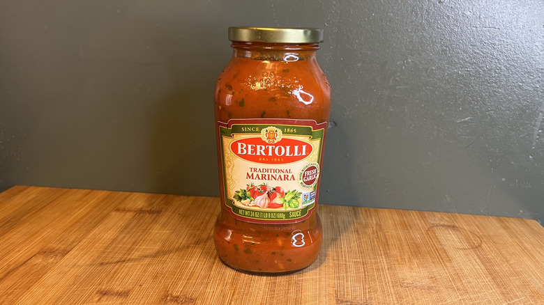 A jar of Bertolli Traditional Marinara Sauce