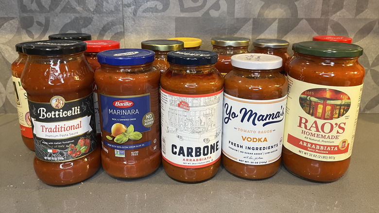 Different jars of pasta sauce on a counter